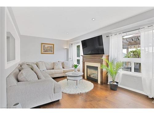 196 Bradley Avenue, Binbrook, ON - Indoor Photo Showing Living Room With Fireplace