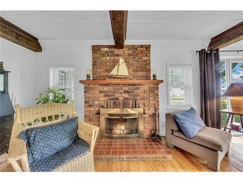 2593 North Shore Drive, Lowbanks, ON - Indoor Photo Showing Living Room With Fireplace