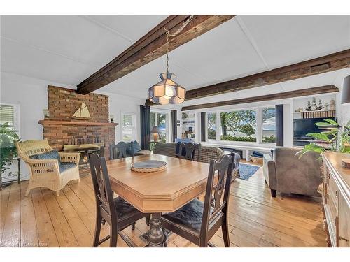 2593 North Shore Drive, Lowbanks, ON - Indoor Photo Showing Dining Room With Fireplace