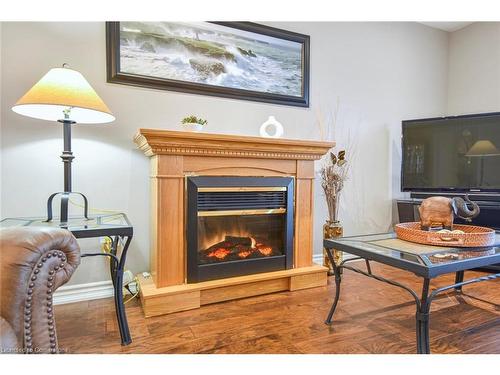 1060 Beach Boulevard, Hamilton, ON - Indoor Photo Showing Living Room With Fireplace