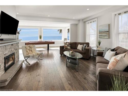 2952 North Shore Drive, Lowbanks, ON - Indoor Photo Showing Living Room With Fireplace