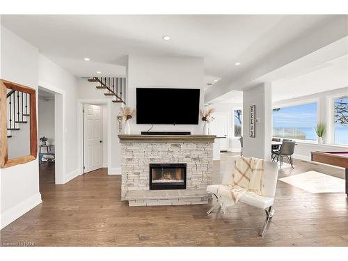 2952 North Shore Drive, Lowbanks, ON - Indoor Photo Showing Living Room With Fireplace