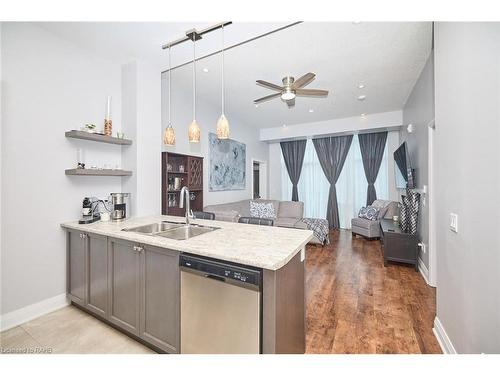 601-16 Concord Place, Grimsby, ON - Indoor Photo Showing Kitchen With Double Sink