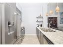 601-16 Concord Place, Grimsby, ON  - Indoor Photo Showing Kitchen With Double Sink With Upgraded Kitchen 