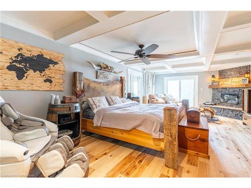 928 Brock Road, Flamborough, ON - Indoor Photo Showing Bedroom With Fireplace