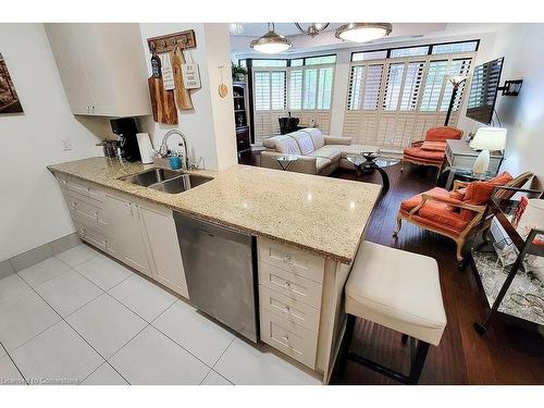 410-112 King Street E, Hamilton, ON - Indoor Photo Showing Kitchen With Double Sink