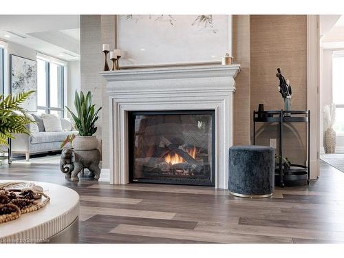 1201-2060 Lakeshore Road, Burlington, ON - Indoor Photo Showing Living Room With Fireplace