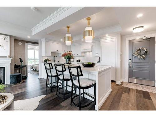 1201-2060 Lakeshore Road, Burlington, ON - Indoor Photo Showing Dining Room With Fireplace