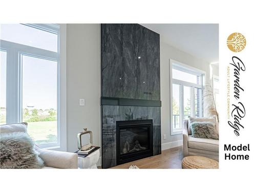 800 Garden Court Crescent, Woodstock, ON - Indoor Photo Showing Living Room With Fireplace