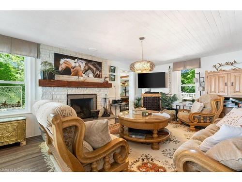 697 Sandy Bay Road, Dunnville, ON - Indoor Photo Showing Living Room With Fireplace