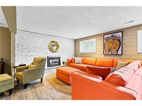 8371 Ares Court, Niagara Falls, ON - Indoor Photo Showing Living Room With Fireplace