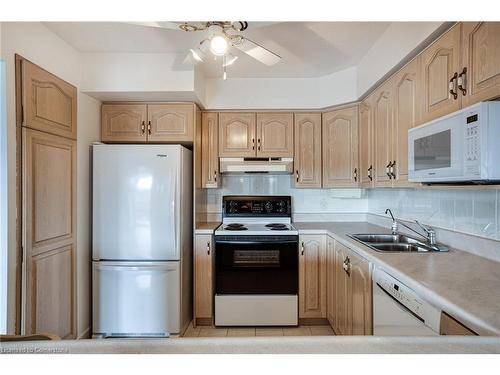 507-500 Green Road, Stoney Creek, ON - Indoor Photo Showing Kitchen With Double Sink