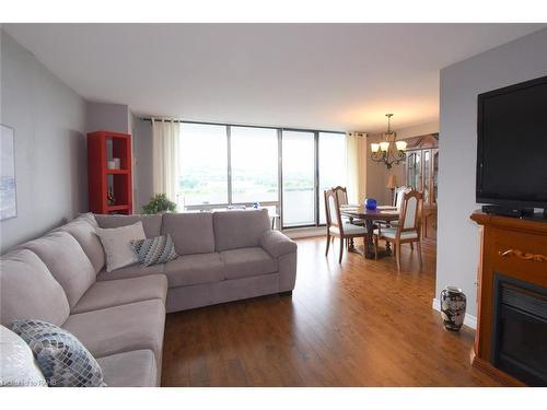 1610-2055 Upper Middle Road, Burlington, ON - Indoor Photo Showing Living Room With Fireplace