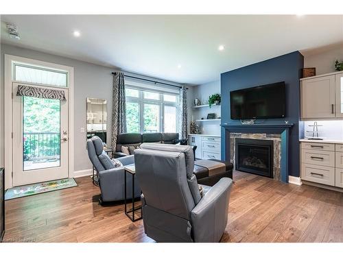 2-9245 Shoveller Drive, Niagara Falls, ON - Indoor Photo Showing Living Room With Fireplace