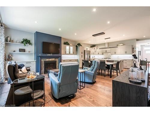 2-9245 Shoveller Drive, Niagara Falls, ON - Indoor Photo Showing Living Room With Fireplace