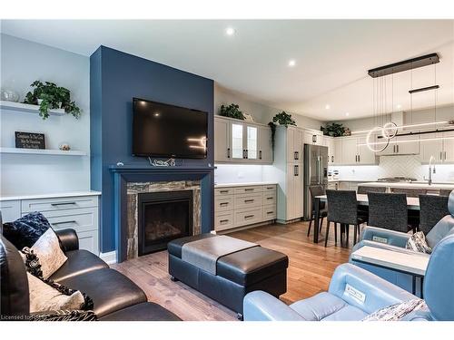 2-9245 Shoveller Drive, Niagara Falls, ON - Indoor Photo Showing Living Room With Fireplace