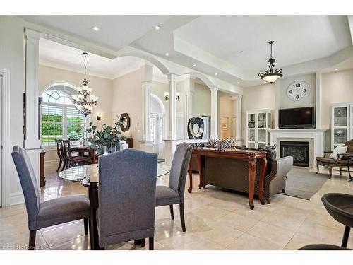 9893 Dickenson Road W, Hamilton, ON - Indoor Photo Showing Dining Room With Fireplace