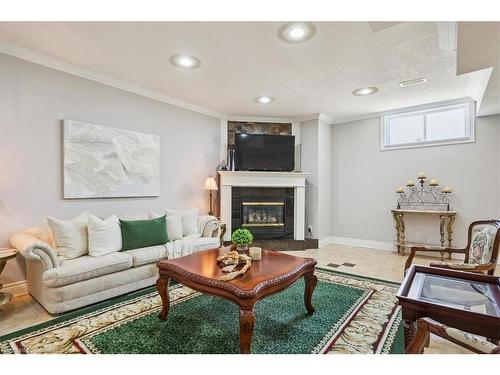 9893 Dickenson Road W, Hamilton, ON - Indoor Photo Showing Living Room With Fireplace