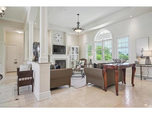 9893 Dickenson Road W, Hamilton, ON - Indoor Photo Showing Living Room With Fireplace