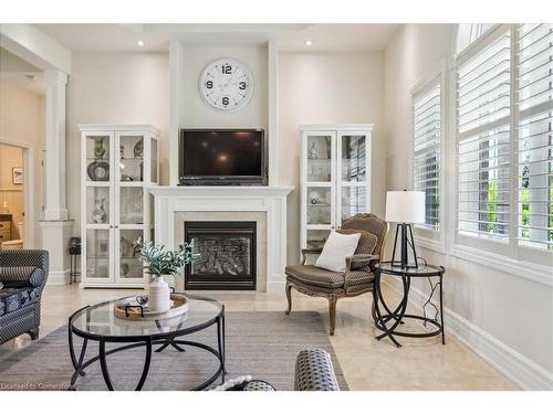 9893 Dickenson Road W, Hamilton, ON - Indoor Photo Showing Living Room With Fireplace