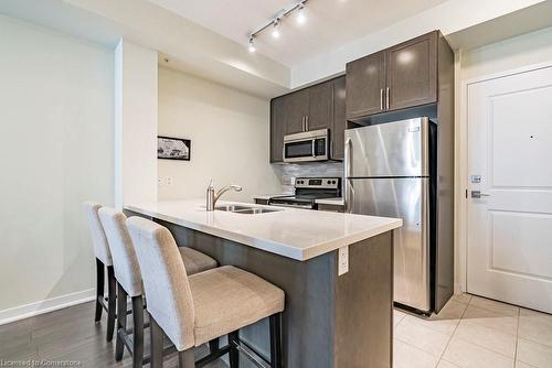 908-85 Robinson Street, Hamilton, ON - Indoor Photo Showing Kitchen With Double Sink