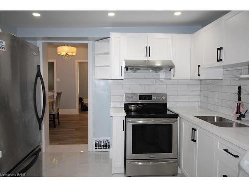 19 Emerald Street N, Hamilton, ON - Indoor Photo Showing Kitchen With Double Sink