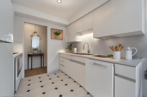 501-67 Caroline Street S, Hamilton, ON - Indoor Photo Showing Kitchen With Double Sink