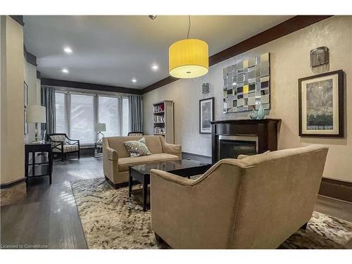 501-67 Caroline Street S, Hamilton, ON - Indoor Photo Showing Living Room With Fireplace