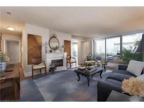 501-67 Caroline Street S, Hamilton, ON - Indoor Photo Showing Living Room With Fireplace