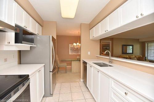 C205-216 Plains Road W, Burlington, ON - Indoor Photo Showing Kitchen With Double Sink