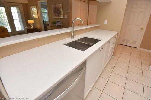 C205-216 Plains Road W, Burlington, ON - Indoor Photo Showing Kitchen With Double Sink