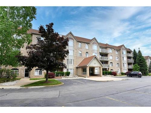 C205-216 Plains Road W, Burlington, ON - Outdoor With Balcony With Facade