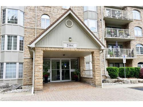 C205-216 Plains Road W, Burlington, ON - Outdoor With Balcony With Facade