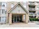 C205-216 Plains Road W, Burlington, ON  - Outdoor With Balcony With Facade 