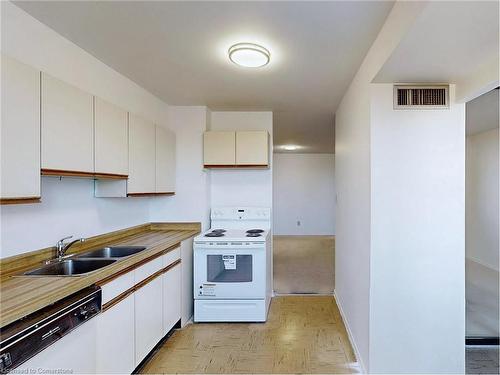 330-25 Bamburgh Circle, Toronto, ON - Indoor Photo Showing Kitchen With Double Sink