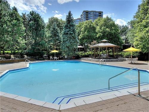 330-25 Bamburgh Circle, Toronto, ON - Outdoor With In Ground Pool With Backyard