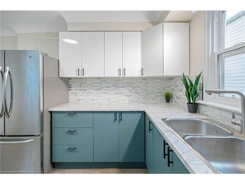 19 Fawell Avenue, St. Catharines, ON - Indoor Photo Showing Kitchen With Double Sink