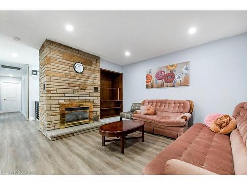 16 Cottage Avenue, Hamilton, ON - Indoor Photo Showing Living Room With Fireplace