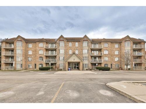 B406-216 Plains Road W, Burlington, ON - Outdoor With Balcony With Facade