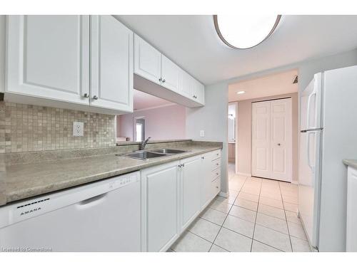 B406-216 Plains Road W, Burlington, ON - Indoor Photo Showing Kitchen With Double Sink