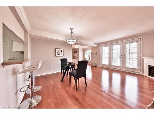 B406-216 Plains Road W, Burlington, ON - Indoor With Fireplace