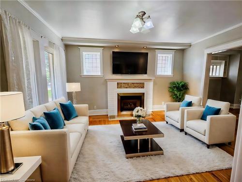 34 Connaught Avenue S, Hamilton, ON - Indoor Photo Showing Living Room With Fireplace