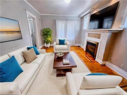 34 Connaught Avenue S, Hamilton, ON - Indoor Photo Showing Living Room With Fireplace