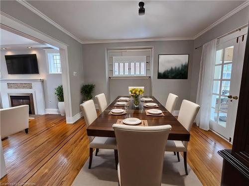 34 Connaught Avenue S, Hamilton, ON - Indoor Photo Showing Dining Room With Fireplace