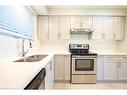 1-716 Mohawk Road W, Hamilton, ON  - Indoor Photo Showing Kitchen With Double Sink With Upgraded Kitchen 