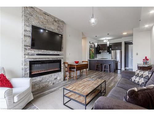 127-5317 Upper Middle Road, Burlington, ON - Indoor Photo Showing Living Room With Fireplace