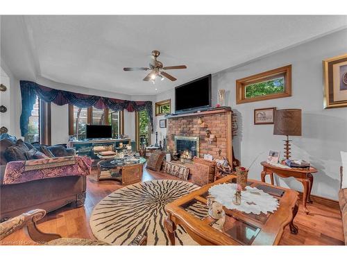 4916 Thirty Road, Beamsville, ON - Indoor Photo Showing Living Room With Fireplace