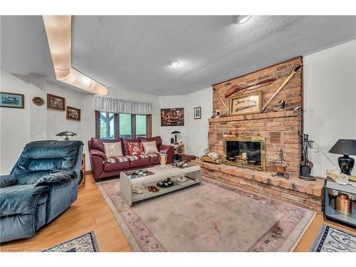 4916 Thirty Road, Beamsville, ON - Indoor Photo Showing Living Room With Fireplace