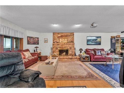 4916 Thirty Road, Beamsville, ON - Indoor Photo Showing Living Room With Fireplace