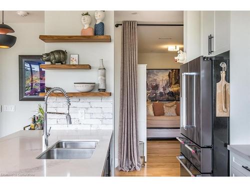 304-101 Locke Street S, Hamilton, ON - Indoor Photo Showing Kitchen With Double Sink